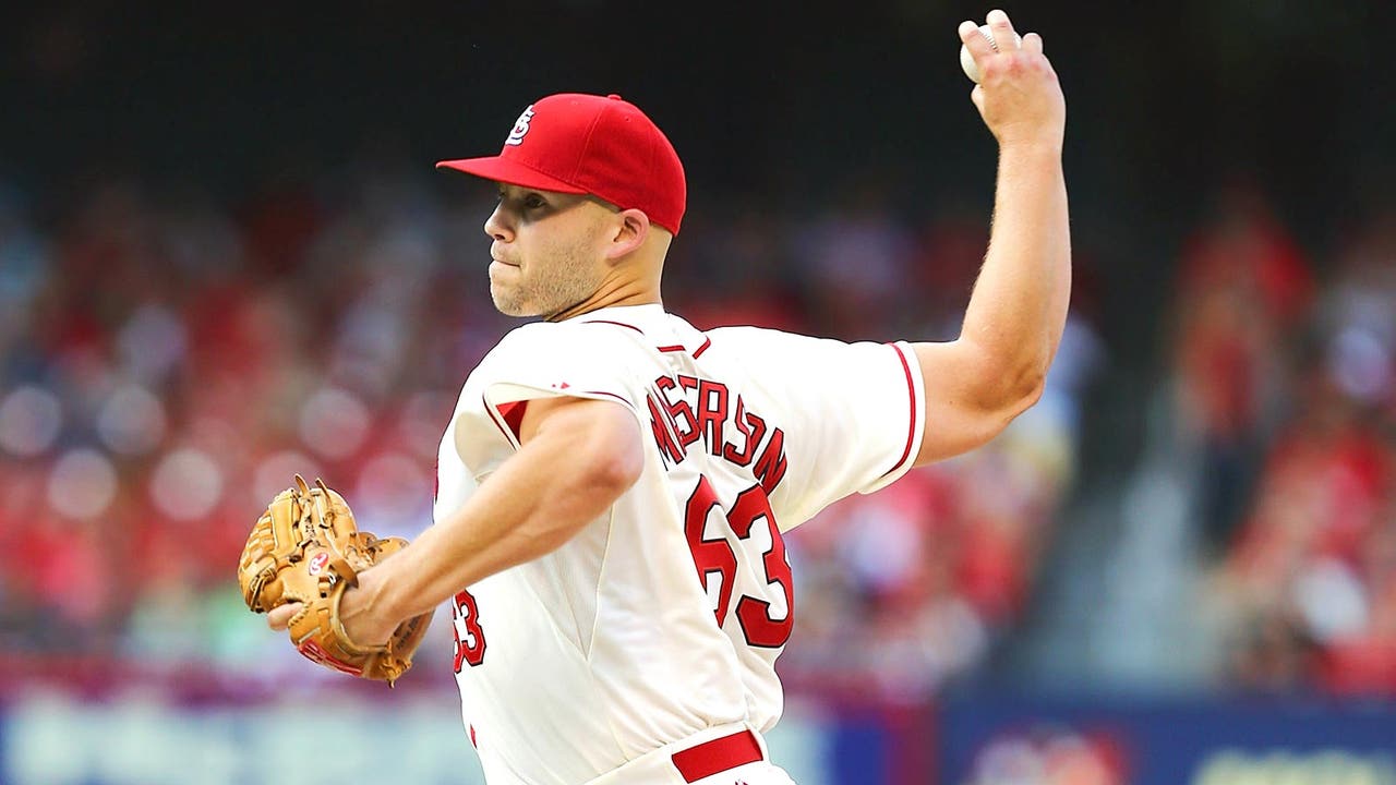 Masterson beats Brewers in his debut as Cardinal